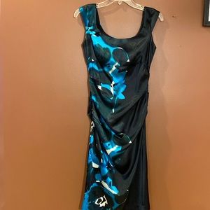 Jessica ladies dress in size 6 petite. Black with floral detailing.